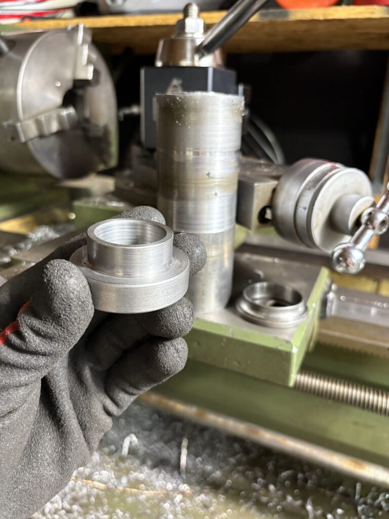 Flanged steering spacer freshly machined on the lathe